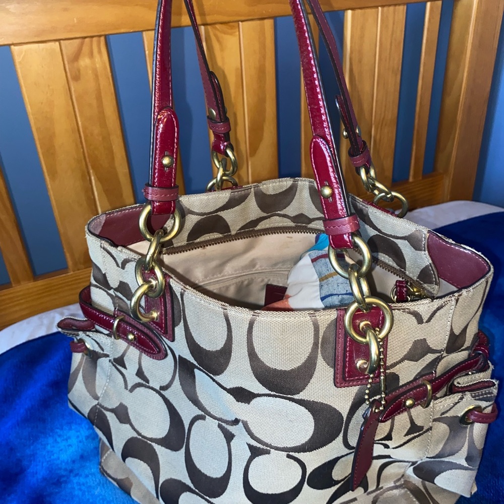 Coach Signature Canvas Handbag, Tan with Burgundy straps and accents.